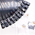 Фольга переводная (4*50см) Zoo Nail Art, новогодняя прозрачная серебро №1450 zn/1450 - фото 558635