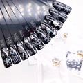 Фольга переводная (4*50см) Zoo Nail Art, новогодняя прозрачная серебро №1452 zn/1452